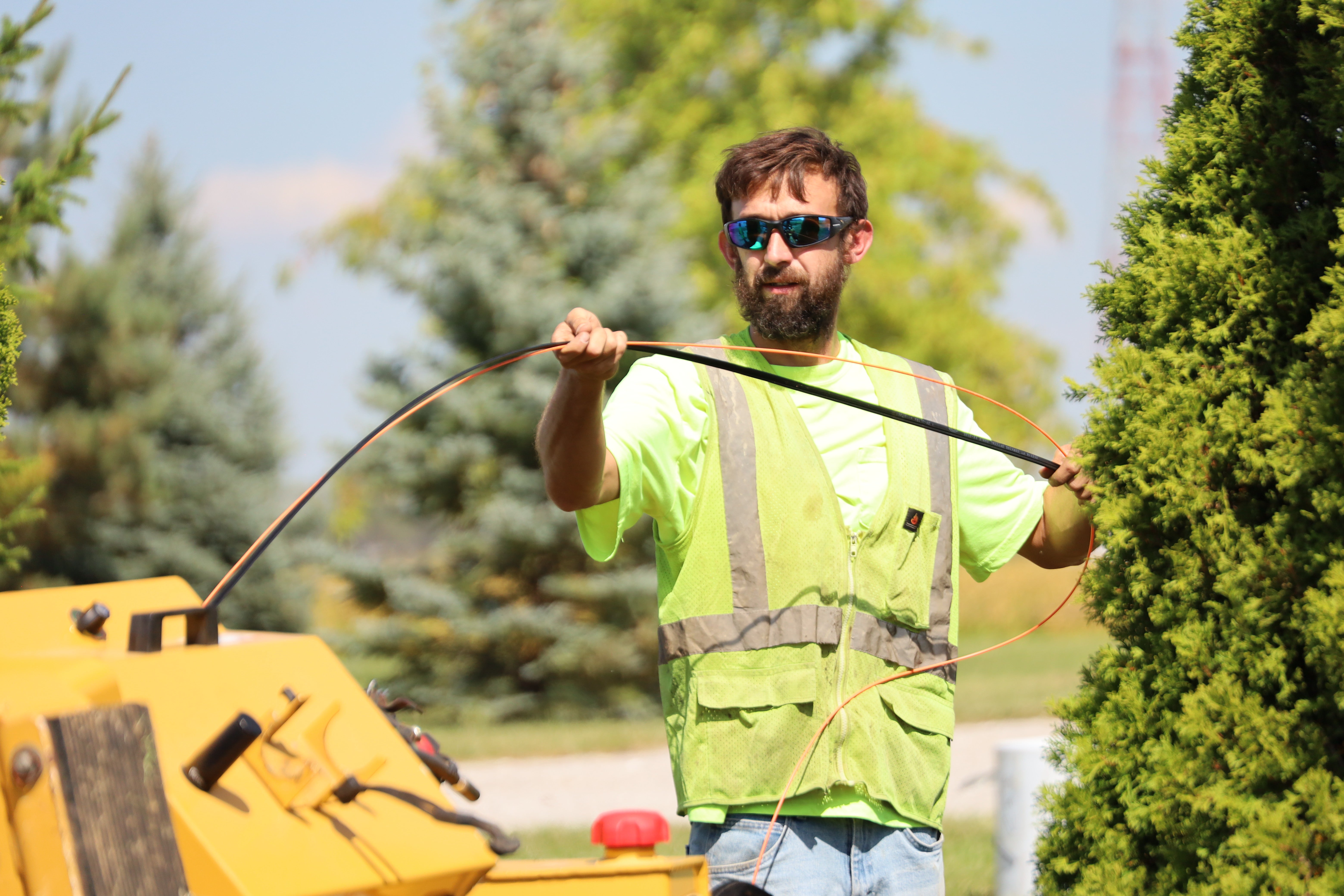 ET Construction contractor doing drop construction for fiber at PPEC member home