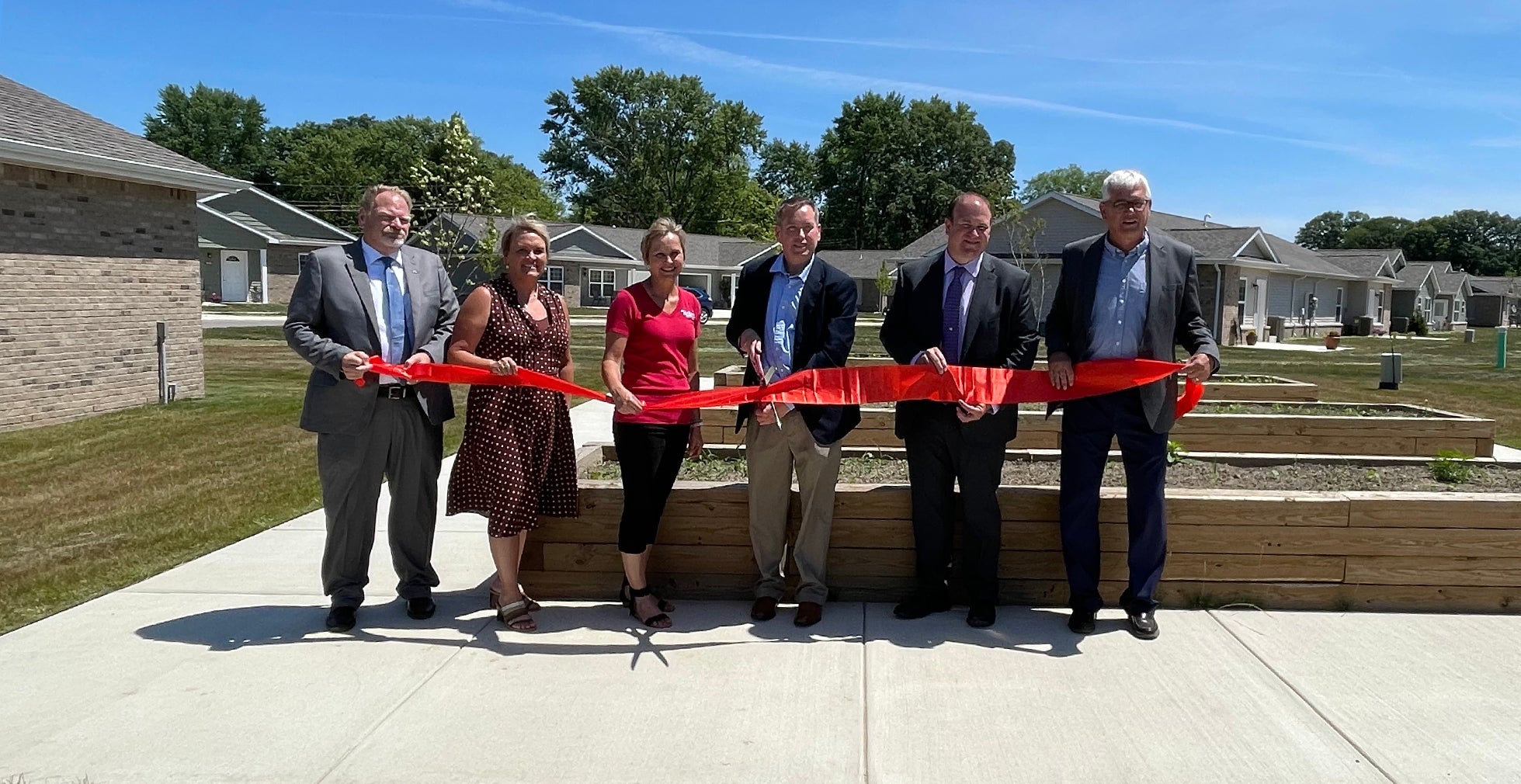 Kady Gene Ribbon cutting 