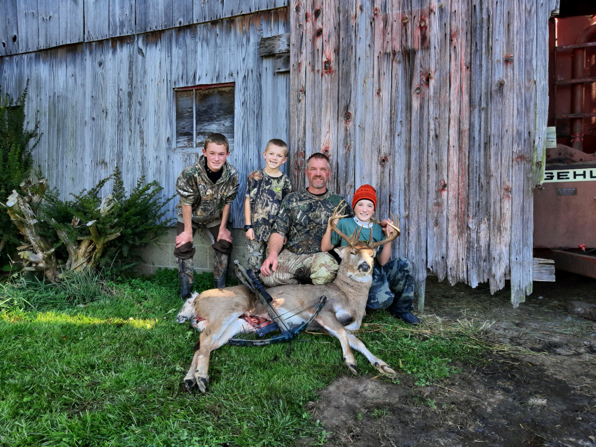 Adam hunting with sons