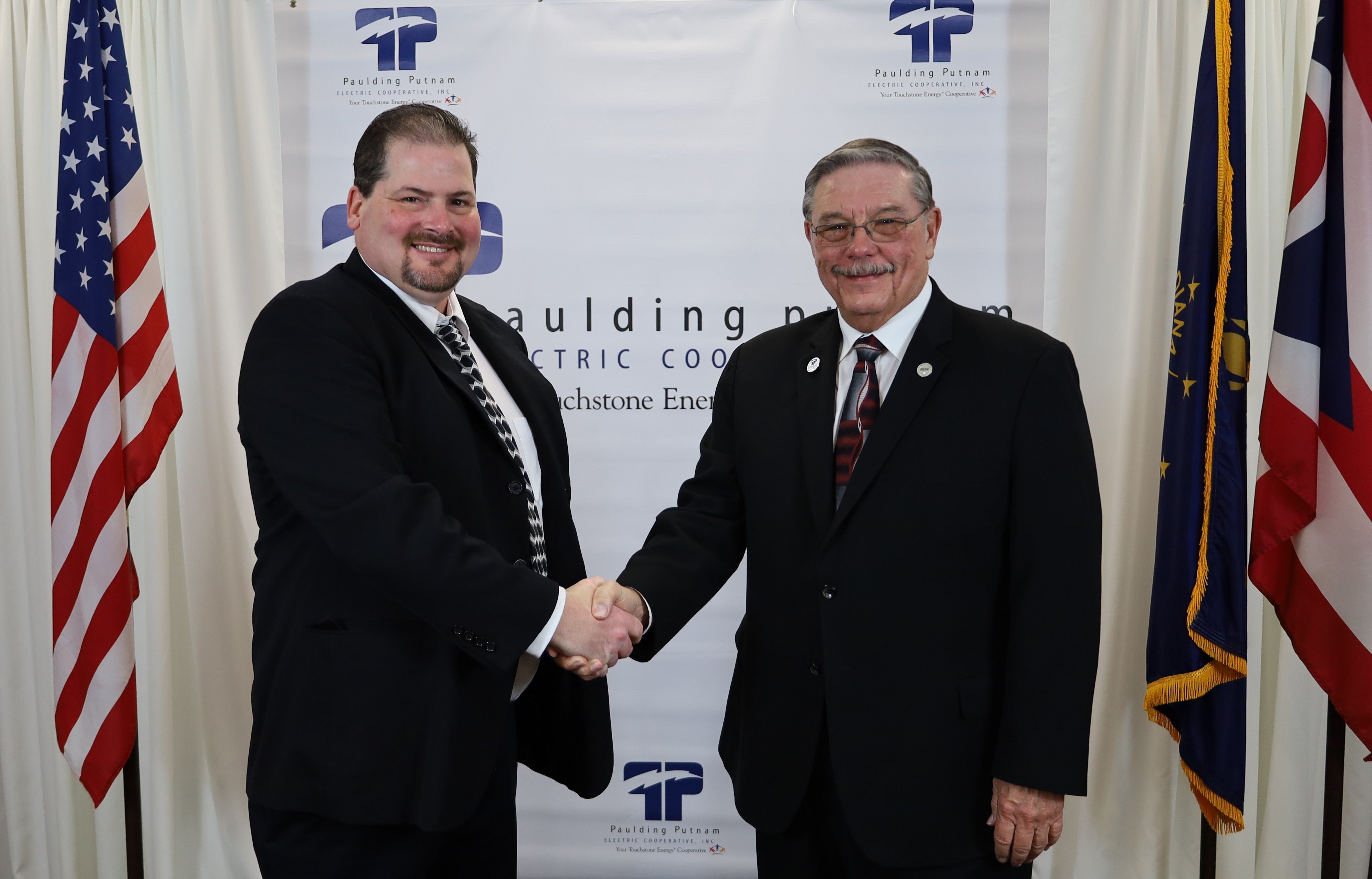 Board chairman Dr. John Saxton welcomes new trustee Bill Beckman to the PPEC board